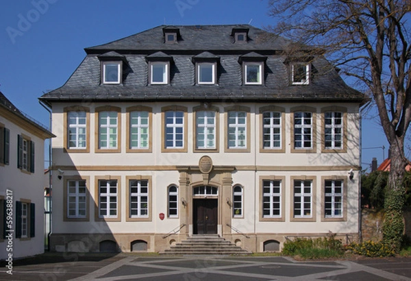 Obraz Facade of a former neo-baroque school building with mansard roof in the old town of Bad Sobernheim in Germany