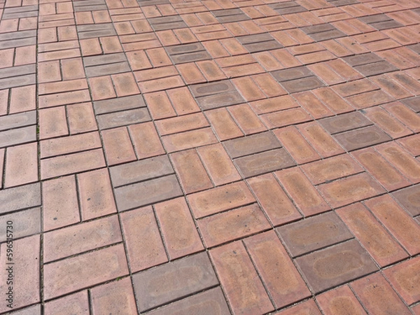 Fototapeta close up textured red brick walkway.