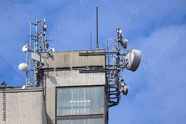 Obraz Antennas on the top of a high building