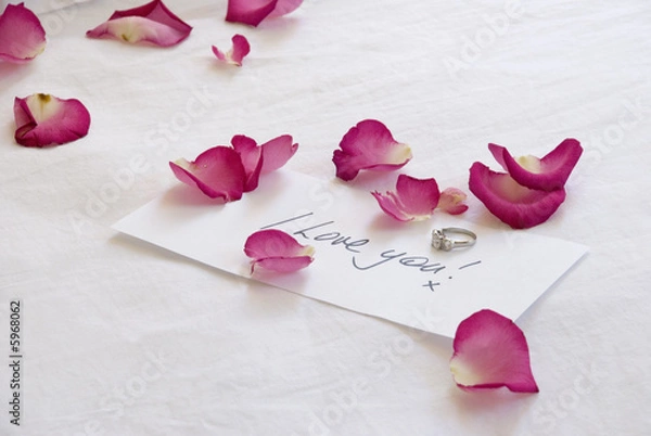 Obraz A handwritten love note and diamond engagement ring 