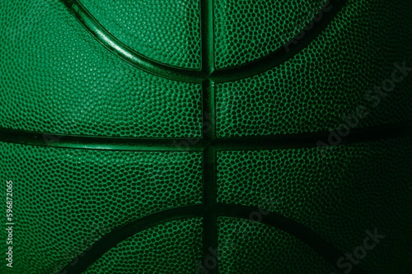 Fototapeta Closeup detail of green basketball ball texture background. Horizontal sport theme poster, greeting cards, headers, website and app