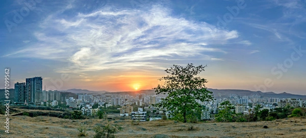 Obraz Panorama image of Beautiful evening sky during Sunset in the Pune city.