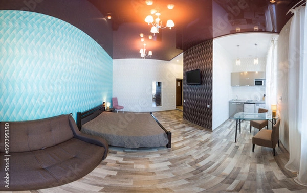 Fototapeta Panoramic photo of the interior of a one-room apartment with kitchen