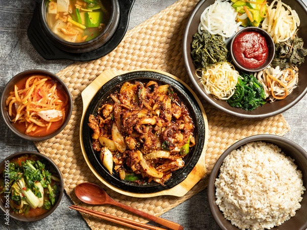 Fototapeta Stir-fried webfoot octopus, various vegetable bibimbap, and soybean paste stew