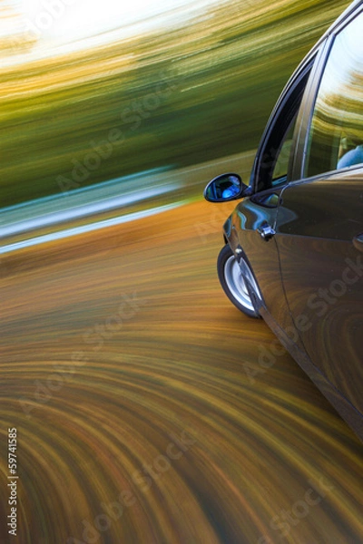 Obraz Side view of car in turn.