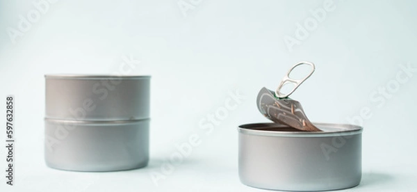 Obraz Food can opened on blue background