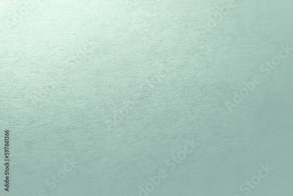 Fototapeta Pale natural soft green color paint on rough environmentally friendly recycled blank cardboard box paper texture background with space and minimalist style