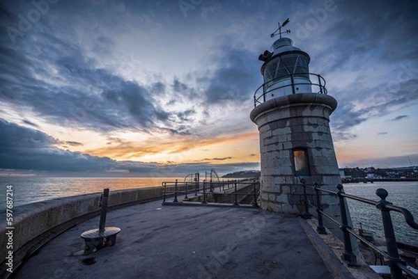 Obraz The Folkestone lighthouse at dusk.