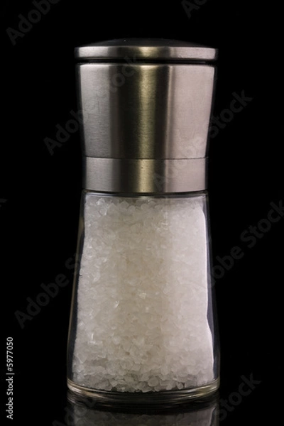 Fototapeta Salt Grinder isolated on a black background
