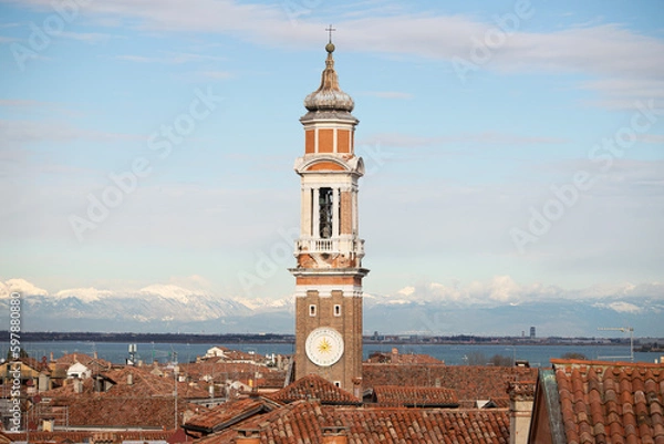 Obraz Top of the Church from Venice undersign by the snow in the mountains, region Veneto, venezia , neve