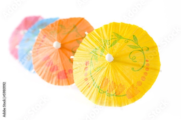 Fototapeta Multicolored Cocktail Umbrellas, spring and summer symbol, isola