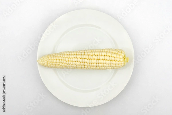 Obraz Corn on a white plate.