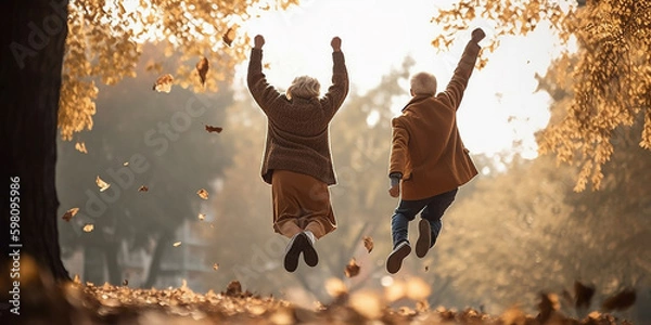 Fototapeta Happy elderly couple jumping high in autumn rural park, view from the back. Generative AI