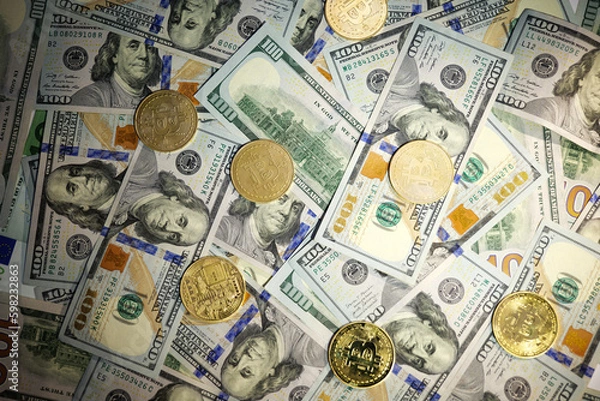 Obraz Online business concept. Golden Bitcoin lies on the banknotes.