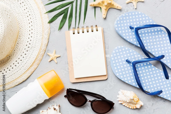 Obraz Blank writing book with summer beach accessories on background, copy space. Flat lay with copy space