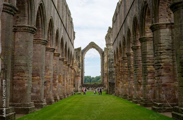 Obraz Symmetry of ruined Fountains Abbey Cistercian monastry. New Yorkshire, England, Great Britain, United Kingdom