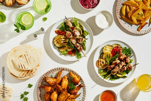 Obraz Picnic table with delicious chicken kebab skewers