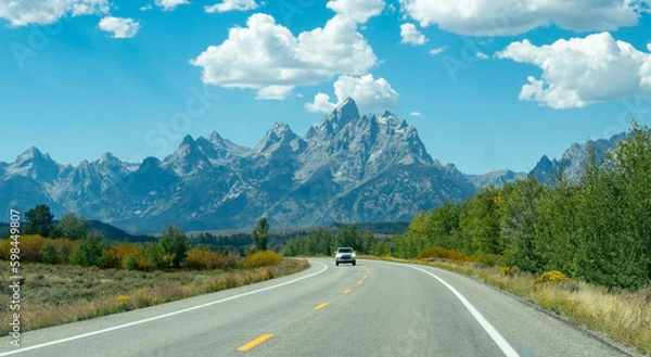 Obraz Grand Teton mountain range over the road. Grand Teton National Park, Wyoming, United States.