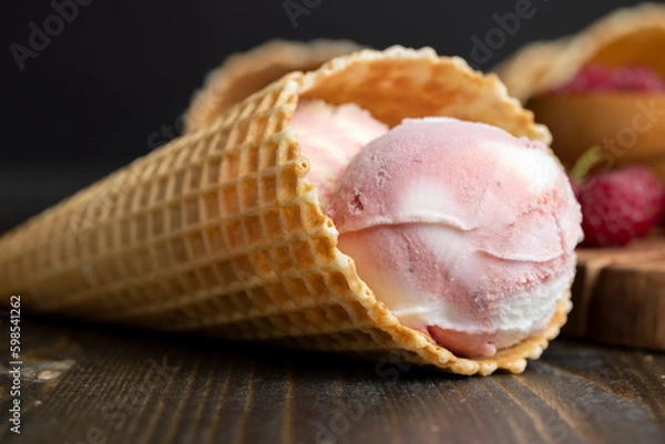 Obraz waffle cone with cream ice cream of pink and white color