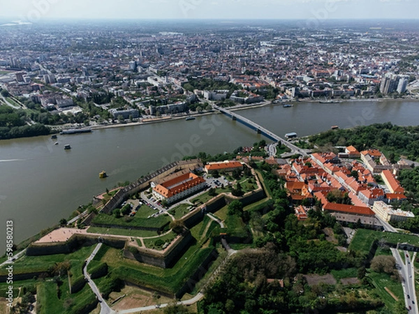 Fototapeta Drone areal shot of Petrovaradin fortress located on the Danube River bank across from Novi Sad. Serbia