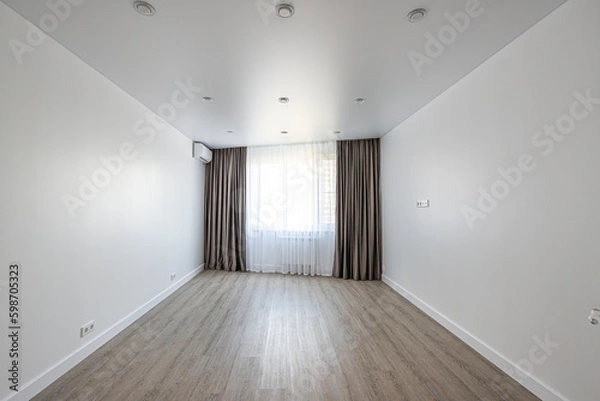 Fototapeta empty room without furniture with white walls and ceiling, curtains