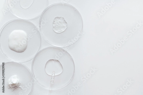 Fototapeta Pipette with Sample of Gels Cosmetic Product in Petri Dish on white background