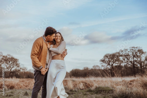 Obraz happy couple in the park on a beautiful sunny day