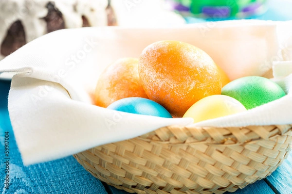 Fototapeta Easter eggs in a basket