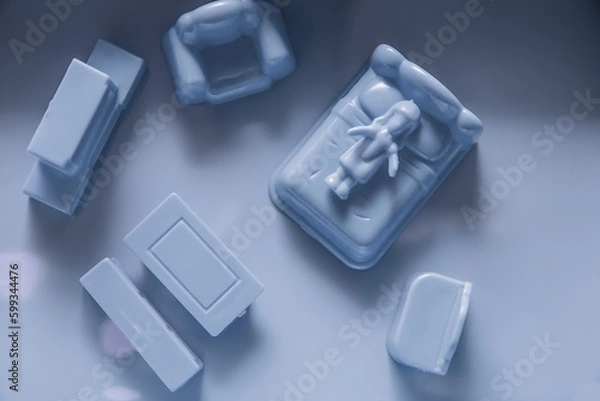 Fototapeta 3D design of mental health in a lonely woman with insomnia and depression on bed in a grey blue room shot top down