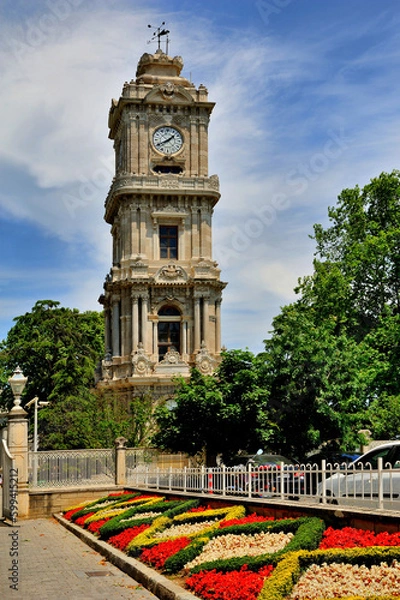 Obraz Fronf of the Dolmabahce Palace Old clock tower in the city of Istanbul, Turkey.