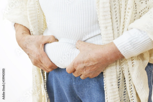 Obraz お腹の贅肉を気にする女性