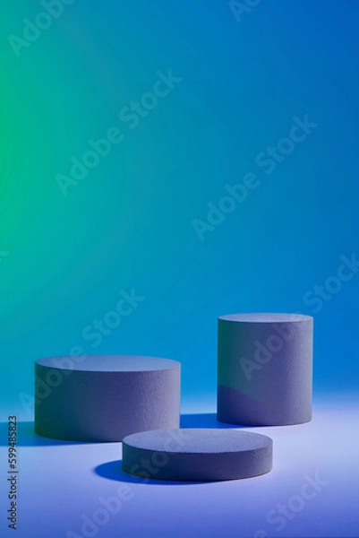 Obraz Abstract background for branding and minimal presentation with three round cylinder podiums displayed on gradient blue background. Front view, copy space for design