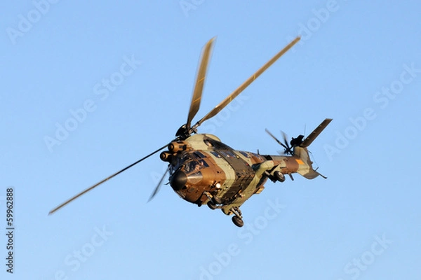 Obraz A antitank helicopter on sky