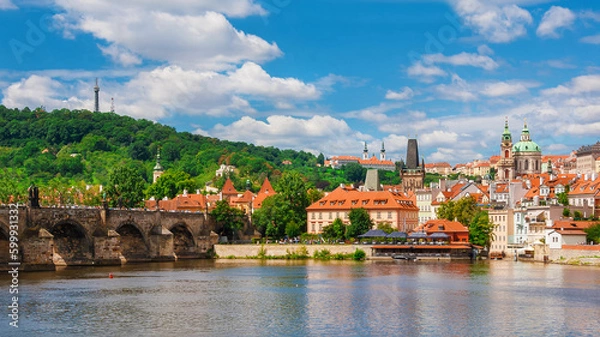 Fototapeta View of Prague Mala Strana old district and River Vltala with the famous Charles Bridge and Petrin Hill