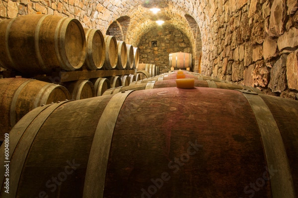 Obraz Barrels in a wine cellar