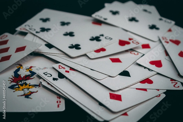 Fototapeta deck of cards on a black background, different combinations