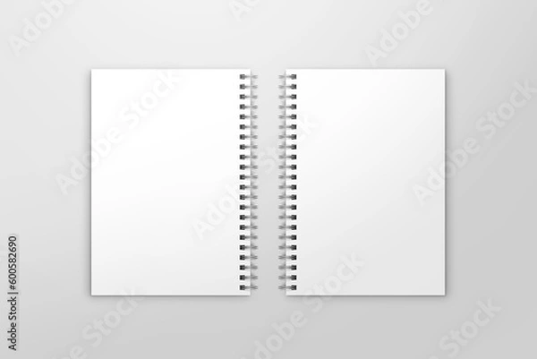 Fototapeta Blank spiral notebook template. Isometric view, on white background. Realistic mockups. For your mockups. 3D illustration, 3D rendering.