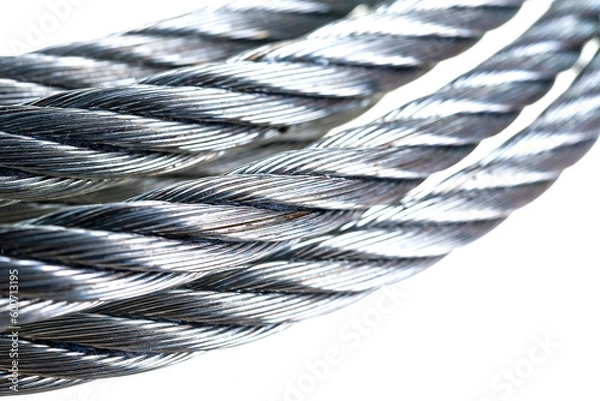 Obraz reducer lifting winch with a metal cable on a white background