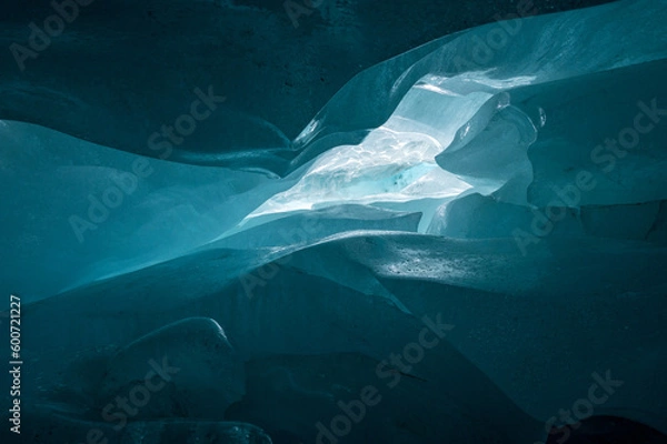 Fototapeta deep blue ice structure in a swiss ice cave in the Valais Alps
