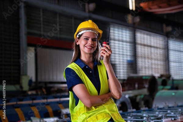 Fototapeta Portrait Female engineering operator wear safety uniform Quality control checking process in factory