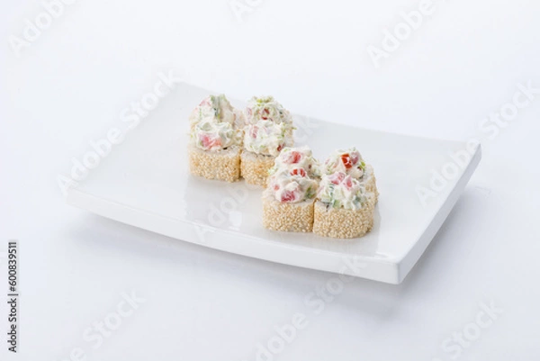 Fototapeta Sushi set and composition at white background. Japanese food restaurant, sushi maki gunkan roll plate or platter set.