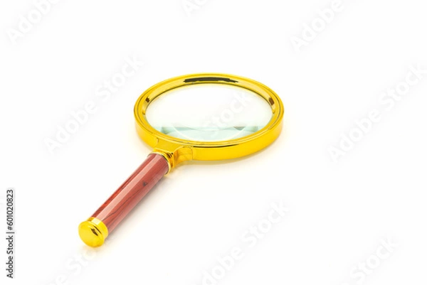 Fototapeta Magnifying glass isolated on a white background