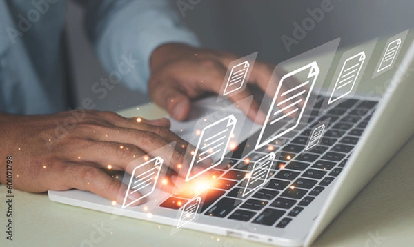 Obraz Business people working on laptop with virtual screen. Online documentation database and document management system concept. Process automation to efficiently manage files, digital file storage system