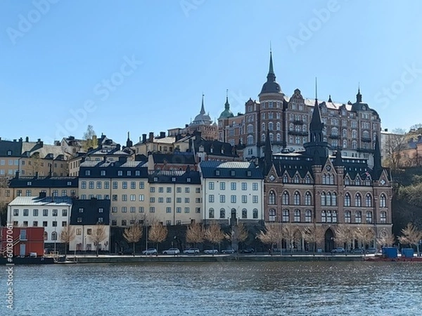 Obraz Panoramic view of Gamla Stan - the old town of Stockholm against the backdrop of water and blue sky.
