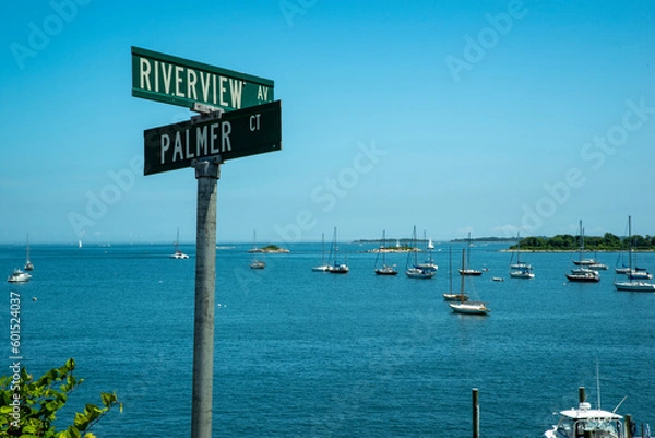 Fototapeta Street names signs overlooking the bay in Noank, CT