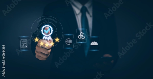 Fototapeta Businessman thumbs up Shows the Quality Assurance (QA) or Standardization (ISO) icon,Concept Certification and Quality Control (QC) Confidence in a business product or service