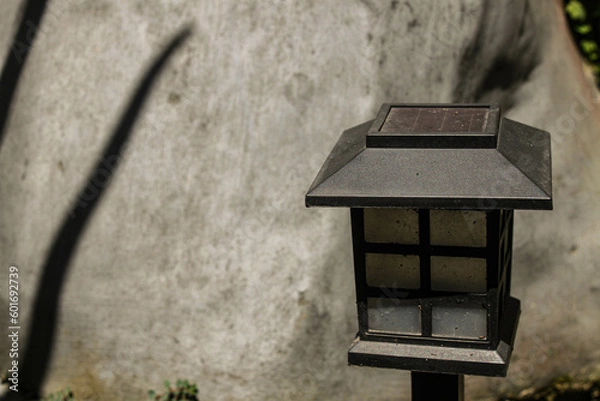 Fototapeta Authentic Japanese Garden Lamp with Big Rock Background, Minimalist Garden Idea, Design Idea 