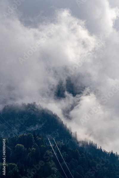 Fototapeta Clouds over the mountain
