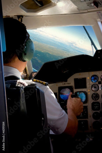 Obraz Pilot w kokpicie