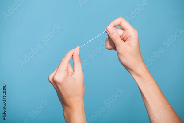 Fototapeta teeth cleaning thread